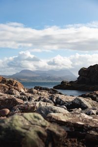 Rocky shore with ocean in the background